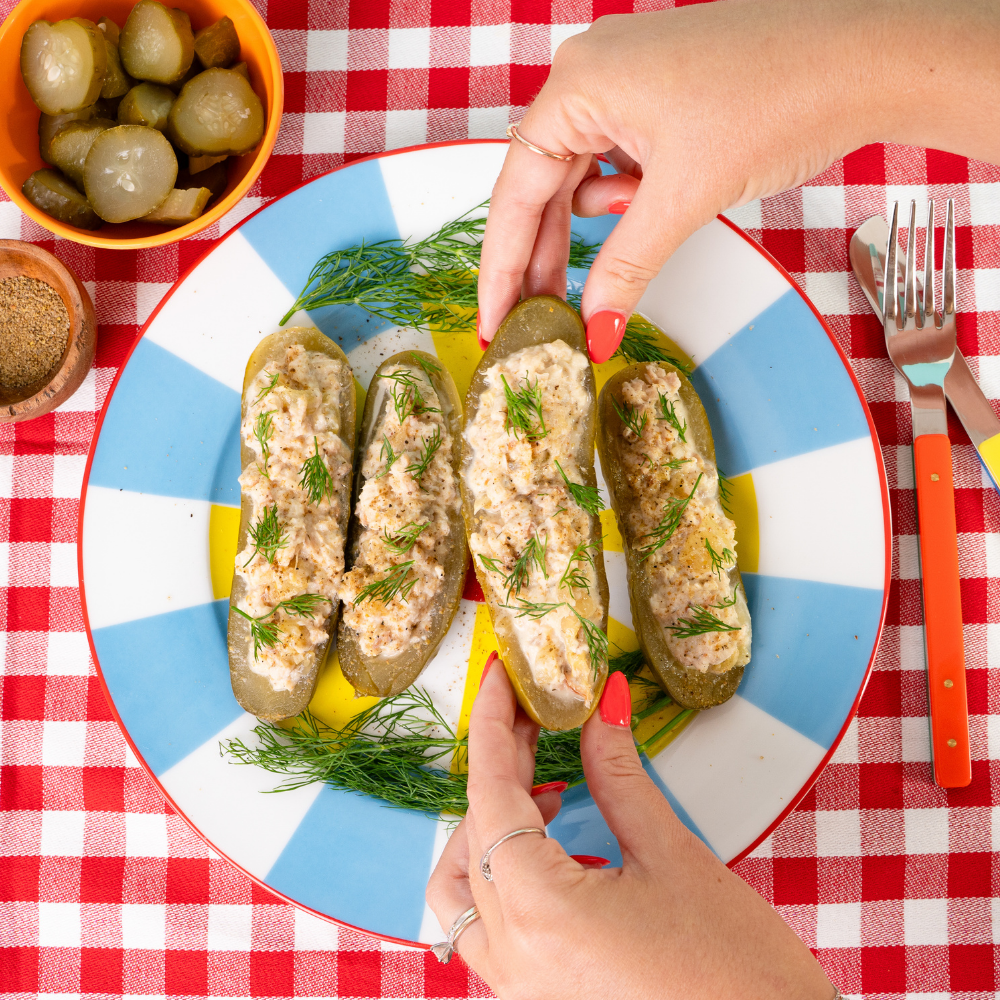 tinned trout with dill pickle mayo in pickle boats