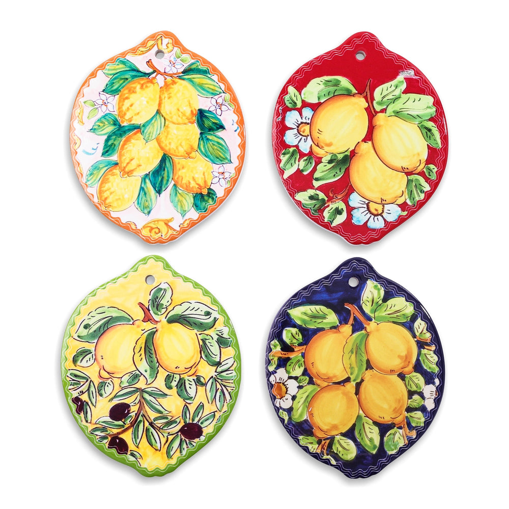 Four colorful coasters with lemon designs on a white background