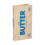Book cover resembling a stick of butter with text that says 'The Butter Book'