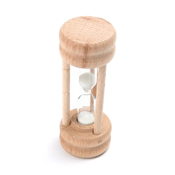Wooden hourglass with sand on a white background