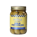 Jar of garlic stuffed olives from The Pickle Factory on a white background