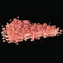Pink Himalayan salt on a black background