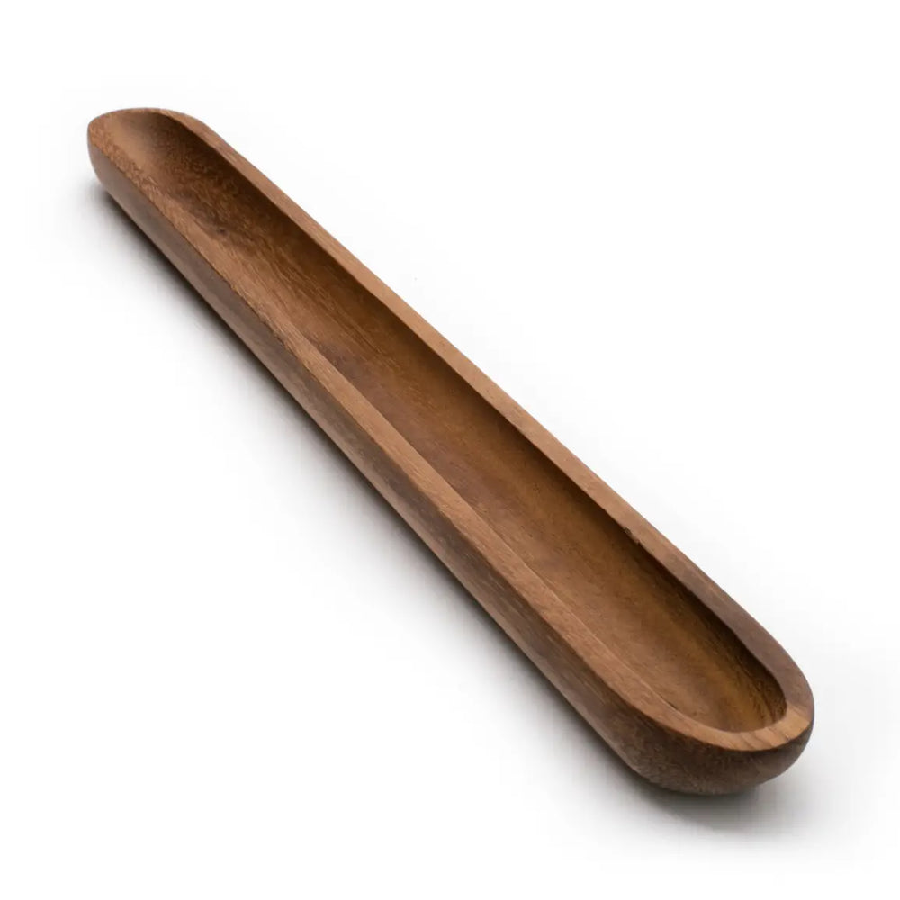 Wooden olive tray on a white bakground