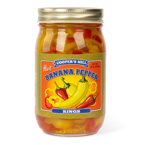 Jar of Coopers Mill hot banana pepper rings on a white background