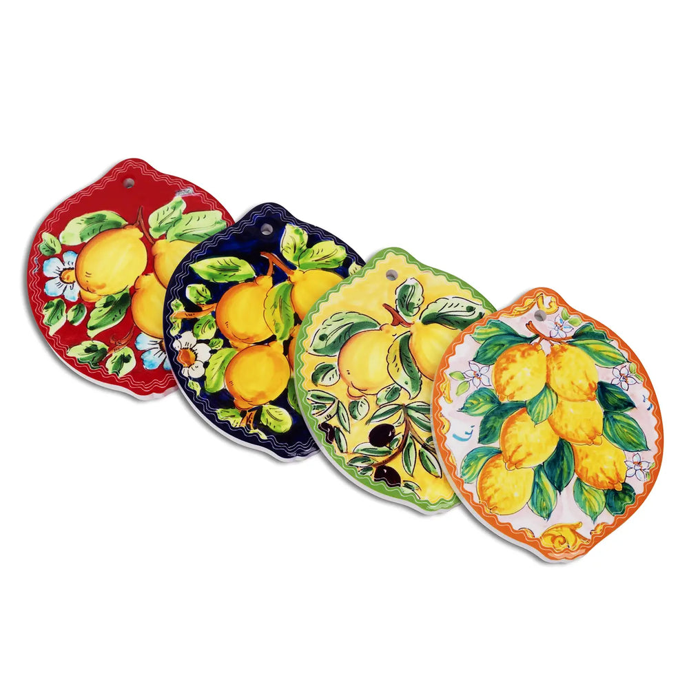 Set of four coasters with lemon designs on a white background