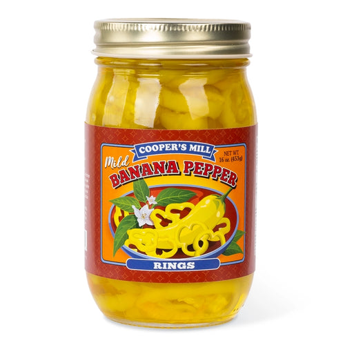 Jar of Cooper's Mill mild banana pepper rings on a white background
