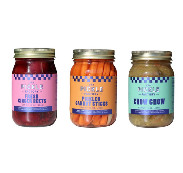 Three jars of The Pickle Factory pickles on a white background