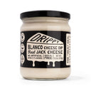 Jar of Drippy Blanco Cheese Dip on a white background