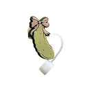 Straw topper shaped like a pickle with a bow on it