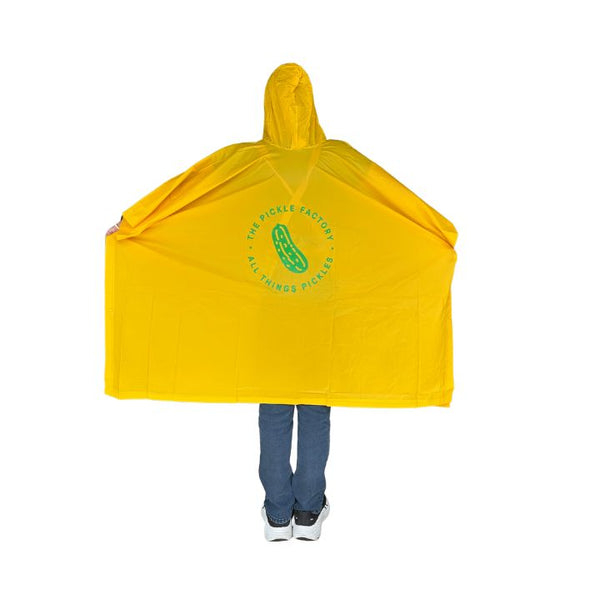 Person wearing a yellow raincoat with a 'The Pickle Factory' logo on a white background
