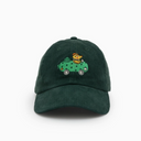 Green cap with embroidered design on a white background
