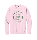 Pink sweatshirt with 'The Pickle Factory Social Club' text and pickle graphic on a white background