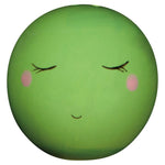 Green pea-shaped salt and pepper shaker with a face on a white background
