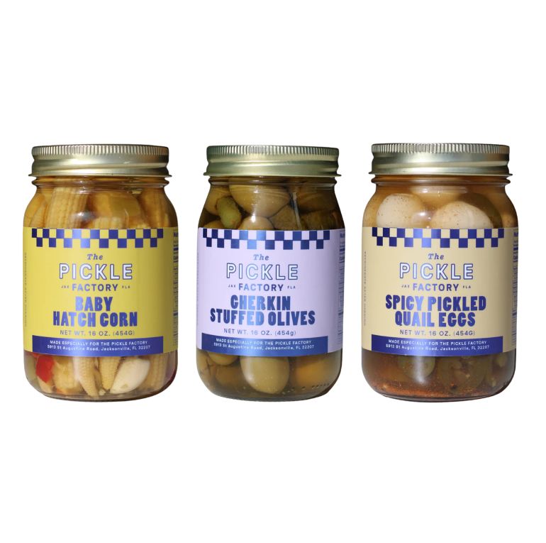 Three jars of pickles from The Pickle Factory on a white background