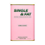 Pink can of Single & Fat Extra Virgin Olive Oil on a white background