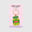 Enamel keychain of a pickle jar on a pink backer card with 'brittany paige' vendor branding.
